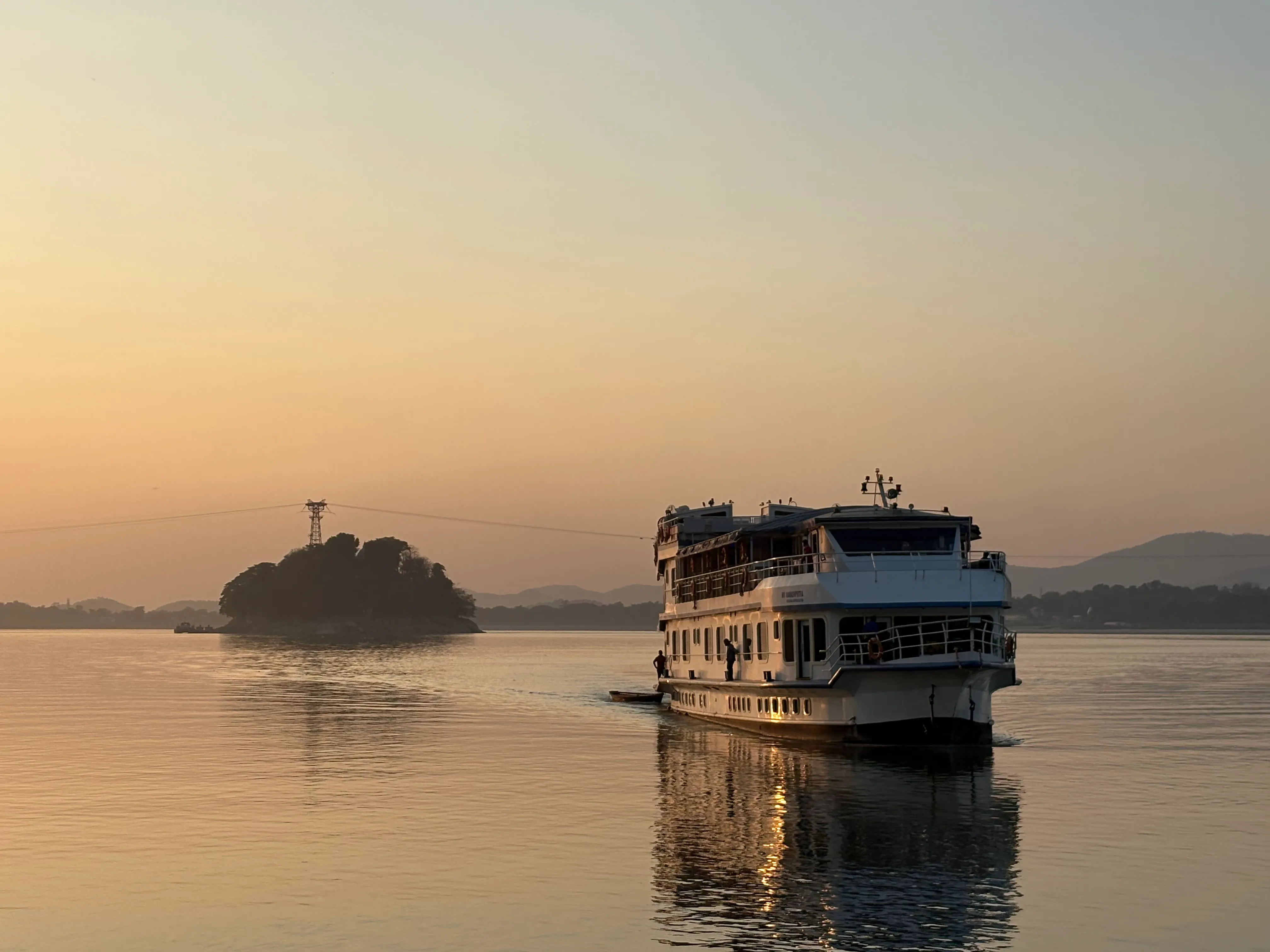 Alfresco Grand on the Brahmaputra as dusk settles over the water