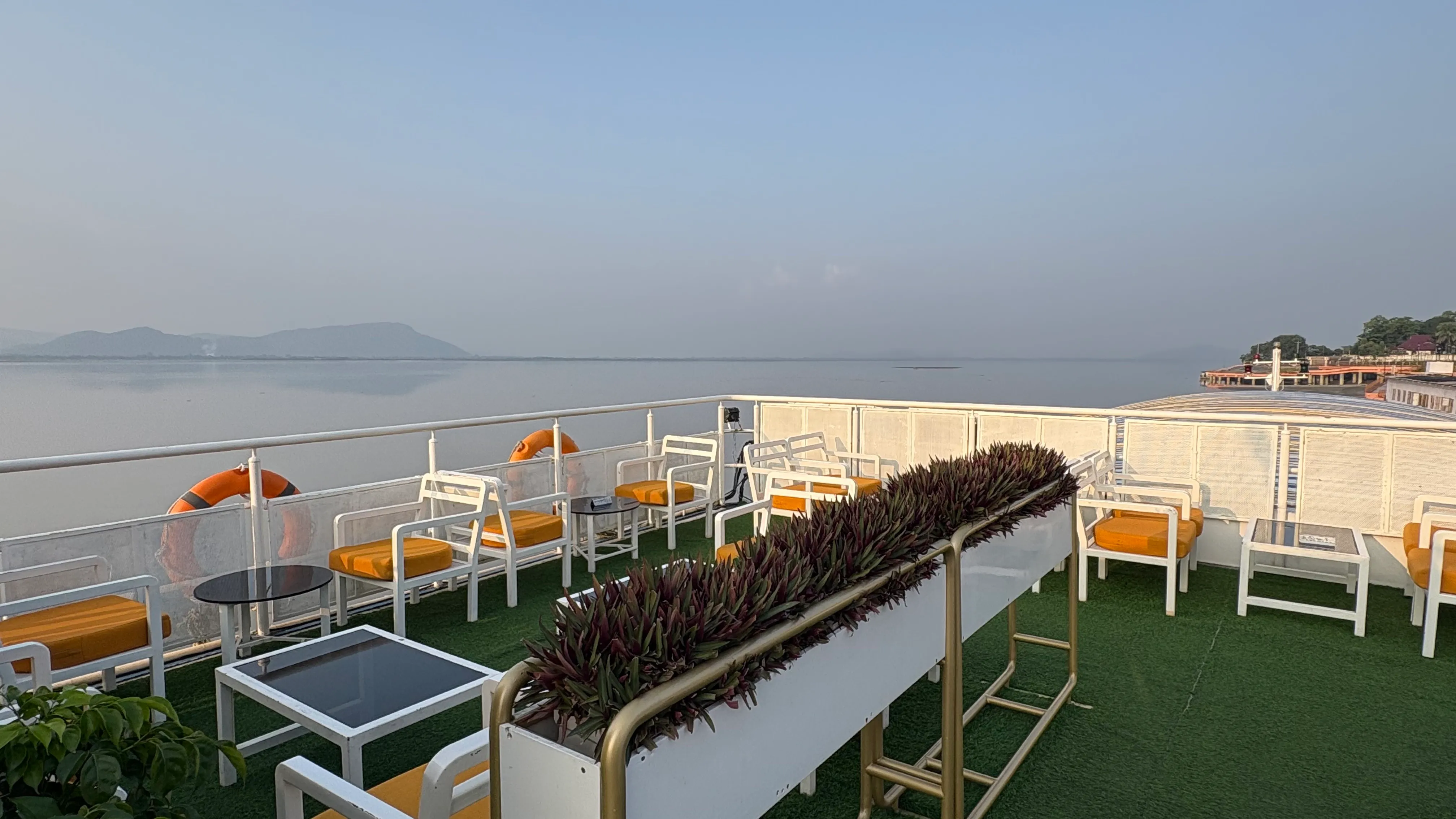 Open-air upper deck seating on Alfresco Grand in daylight