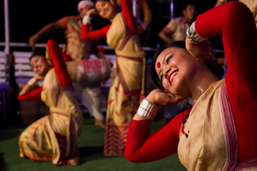 Bihu dancers performing on the deck of the Alfresco Grand dinner cruise